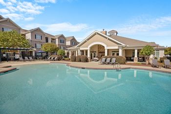 Zero-entry swimming pool with resort lounging